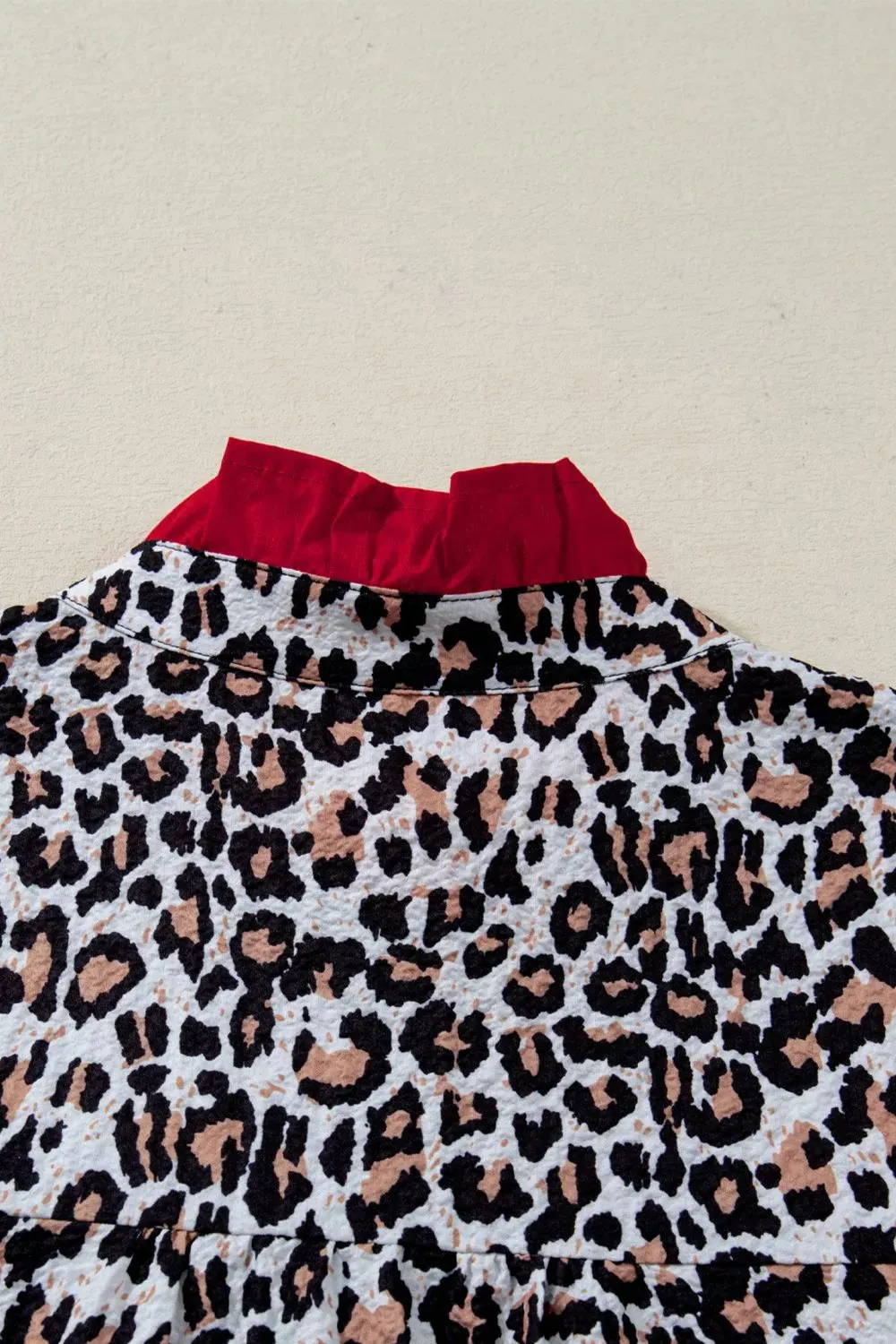 Contrast Frilled V Neck Trimmed Leopard Shirt sold by Charming Charlie product image thumbnail 5