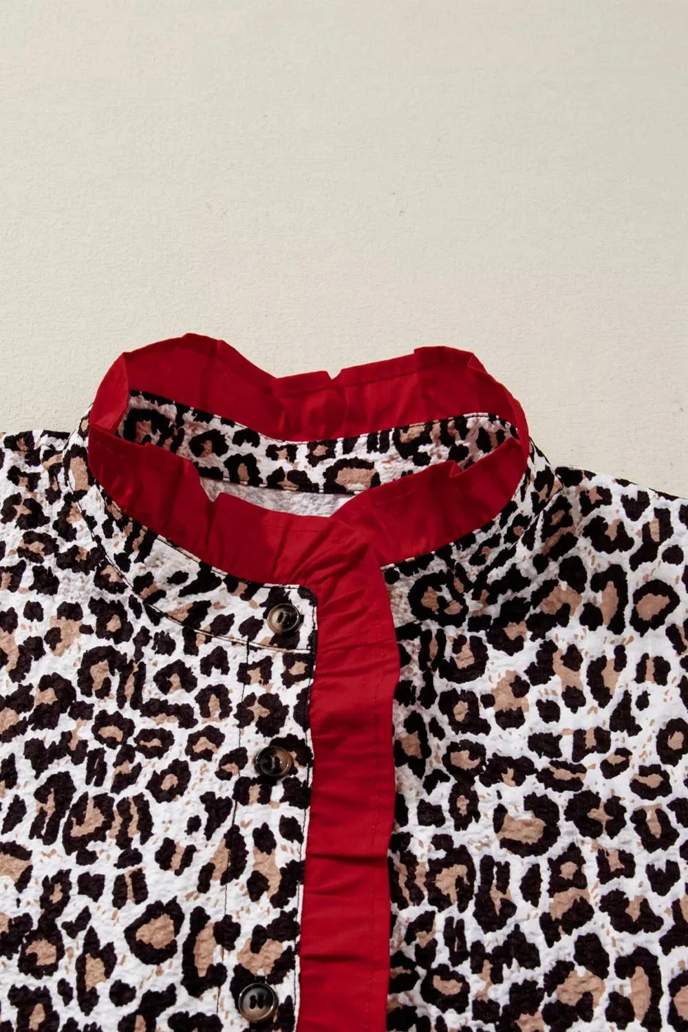 Contrast Frilled V Neck Trimmed Leopard Shirt sold by Charming Charlie product image thumbnail 4