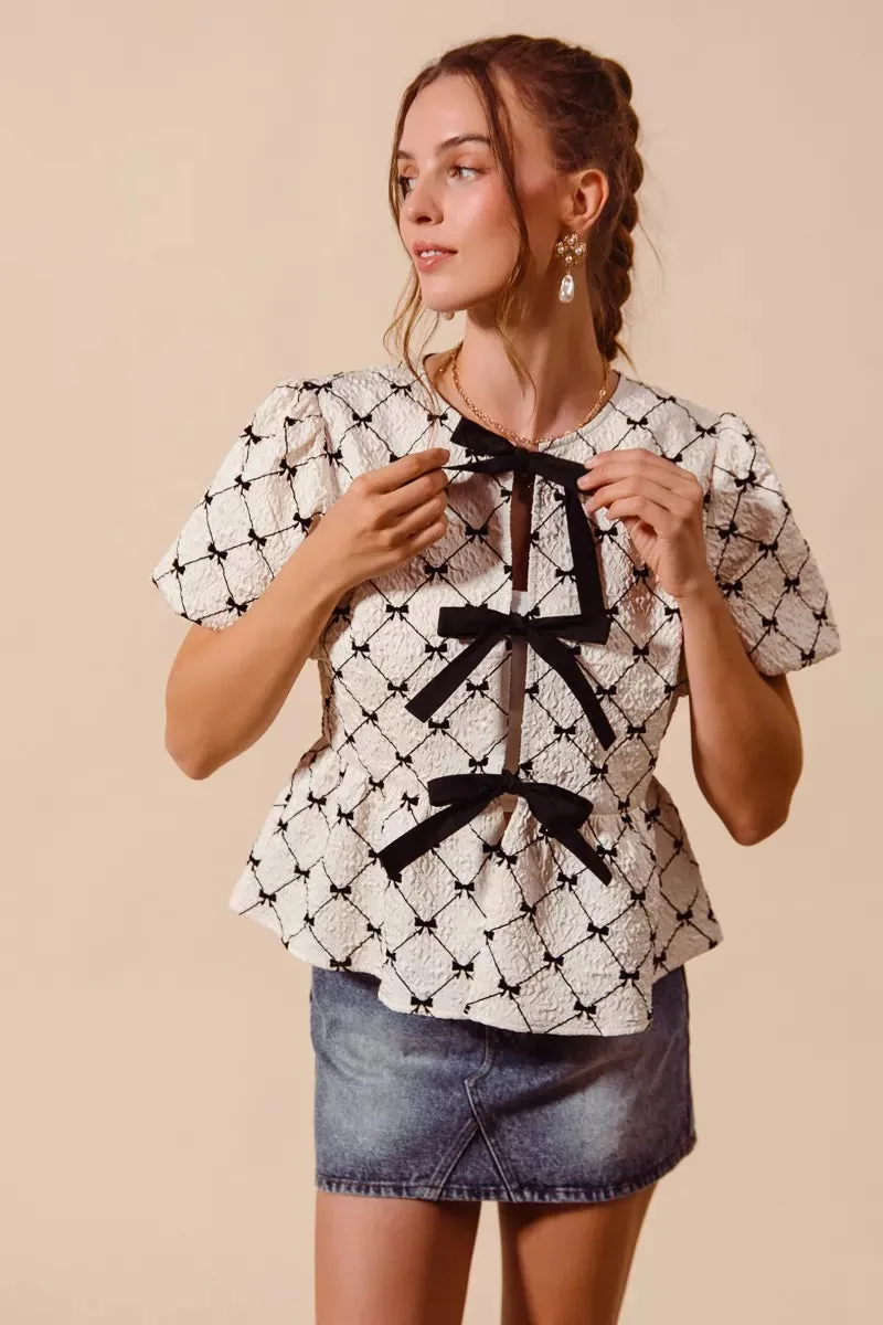 SO ME Bow Texture Woven Peplum Top With Contrast Tie sold by Charming Charlie product image thumbnail 4