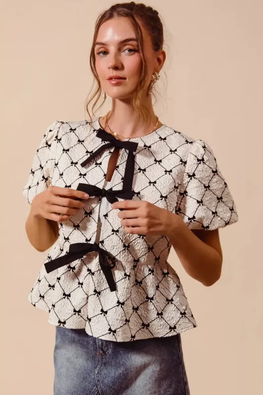 SO ME Bow Texture Woven Peplum Top With Contrast Tie made by Trendsi
