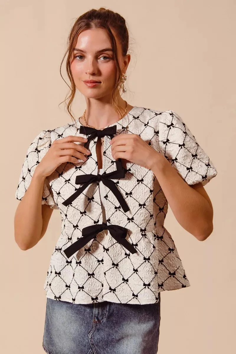 SO ME Bow Texture Woven Peplum Top With Contrast Tie sold by Charming Charlie product image thumbnail 2