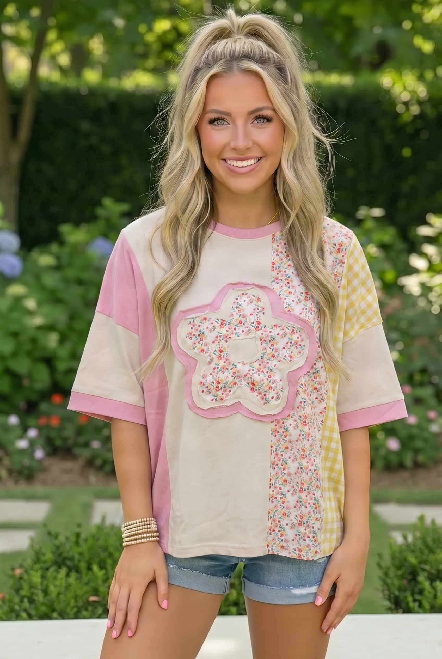 Patchwork Flower Oversized Tee in Pink and Yellow sold by Charming Charlie