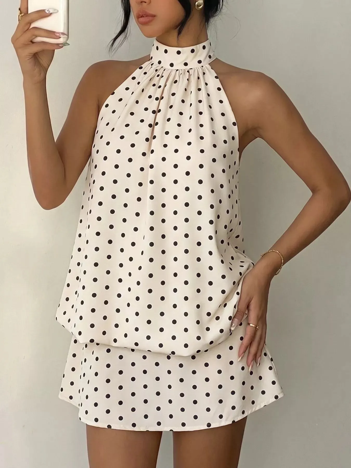 Polka Dot Halter Neck Mini Dress sold by Charming Charlie