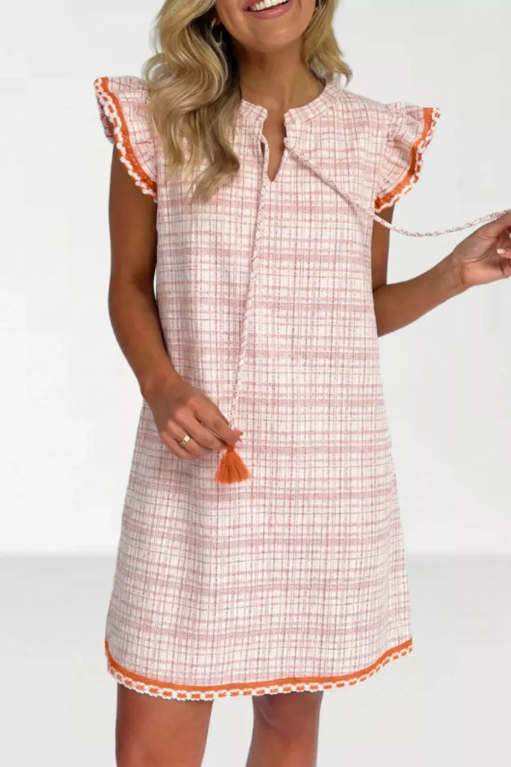 Jacquard Textured Contrast Trim Short Sleeve Tassel Tie Shift Dress sold by Charming Charlie