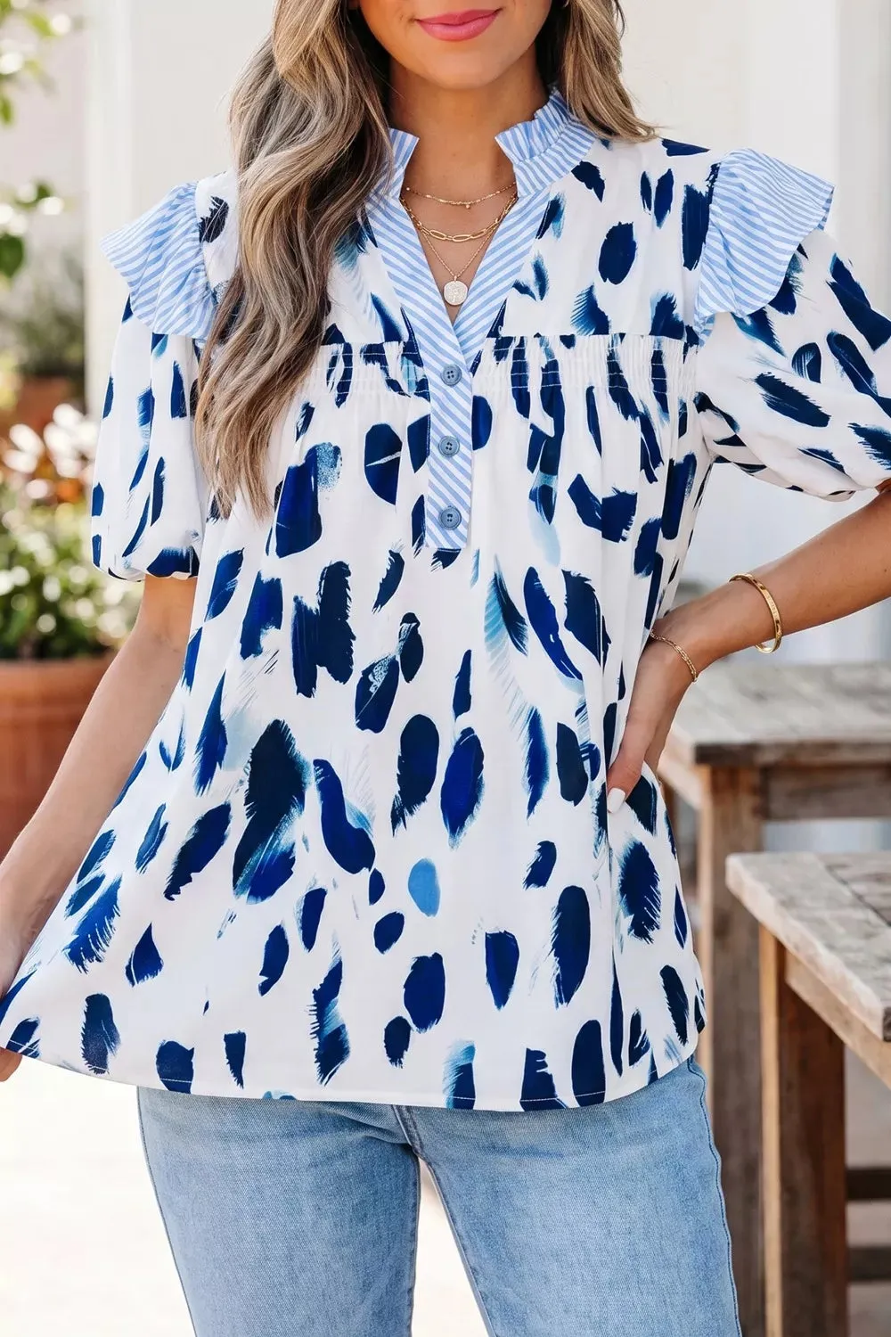 Abstract Animal Print Striped Ruffle Trim V Neck Blouse sold by Charming Charlie