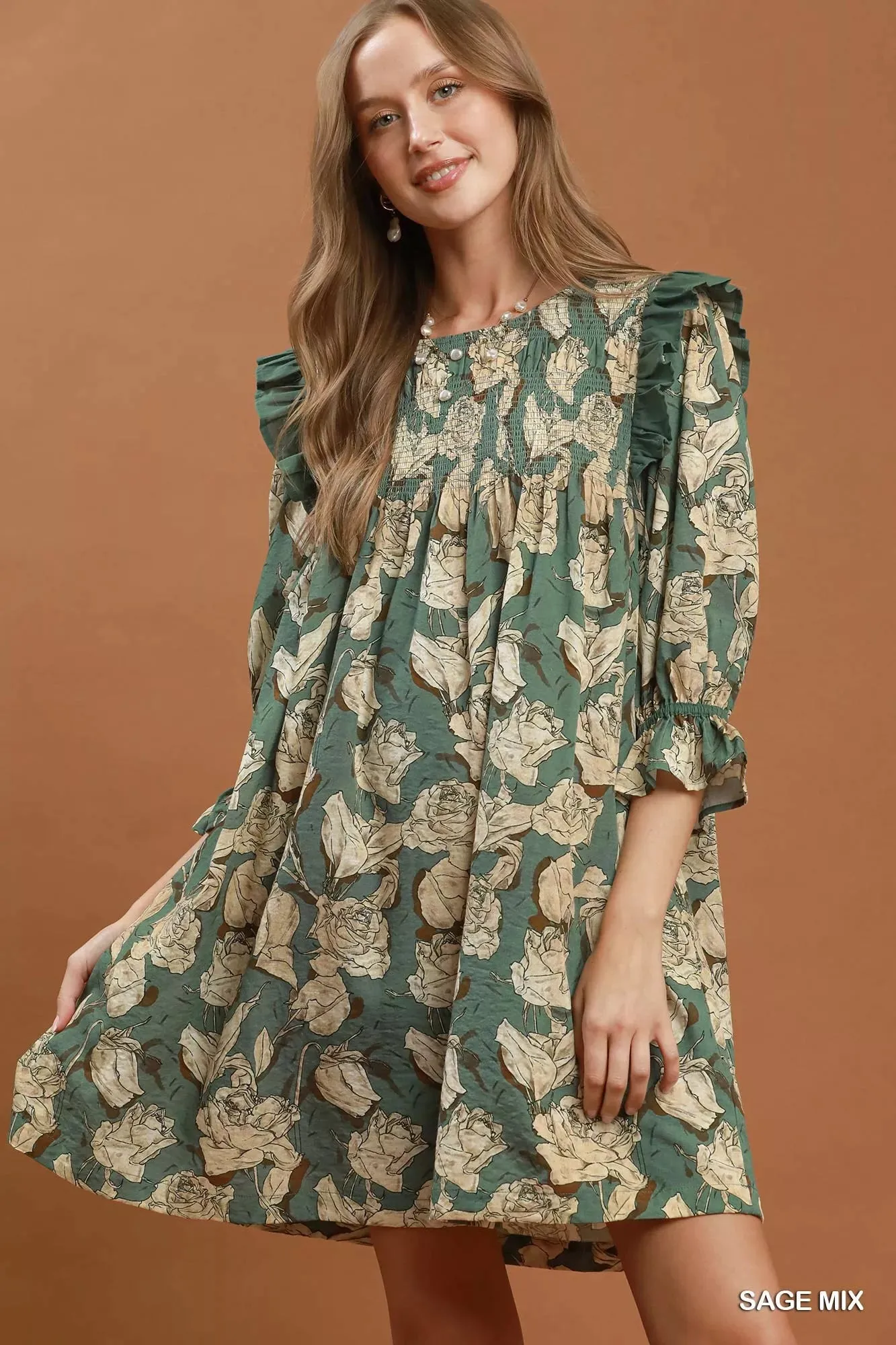 Umgee Mix Floral Print Smocked Ruffle Detail Flowy Dress sold by Charming Charlie
