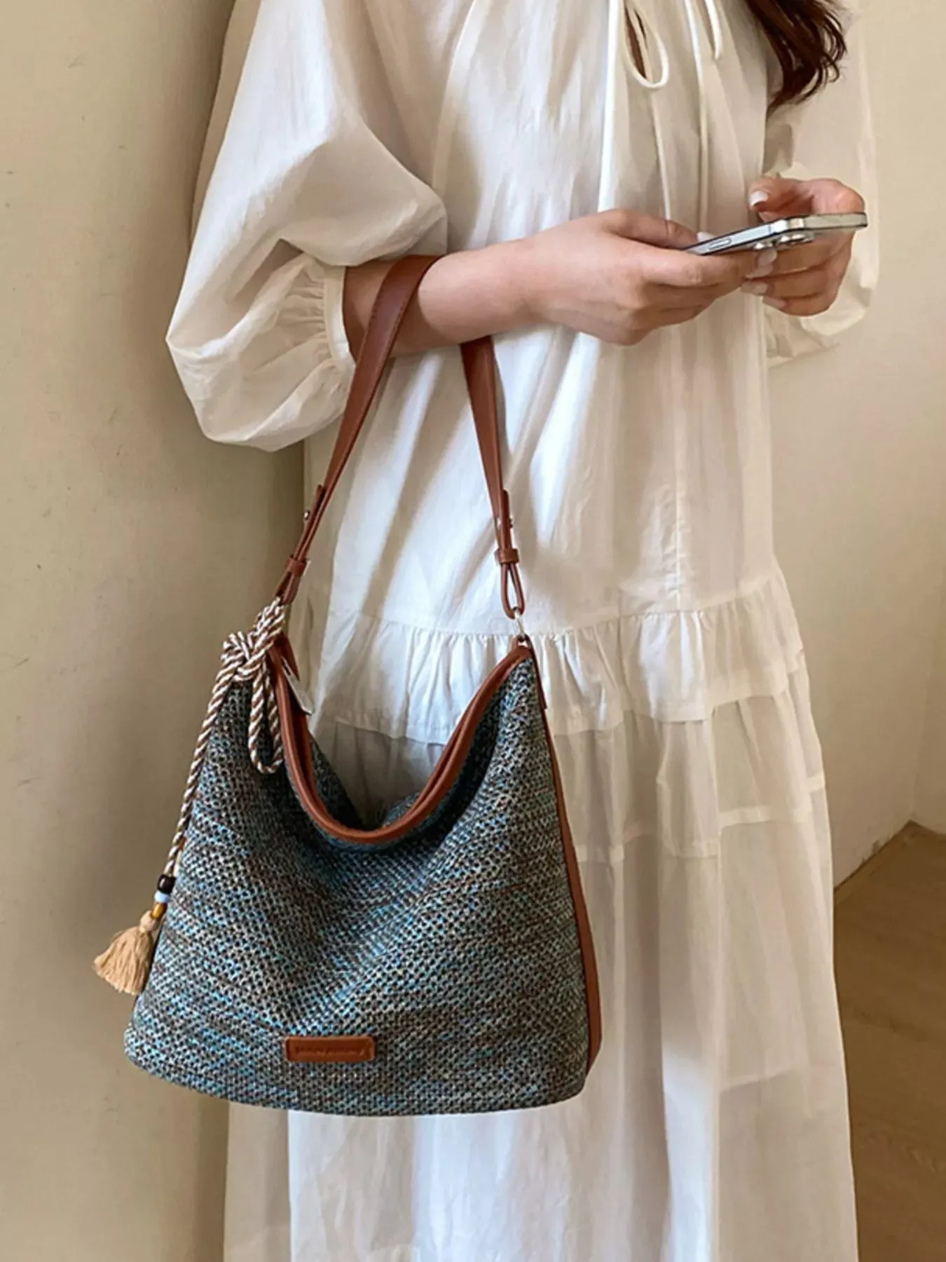 Tassel Woven Crossbody Bag sold by Charming Charlie product image thumbnail 3