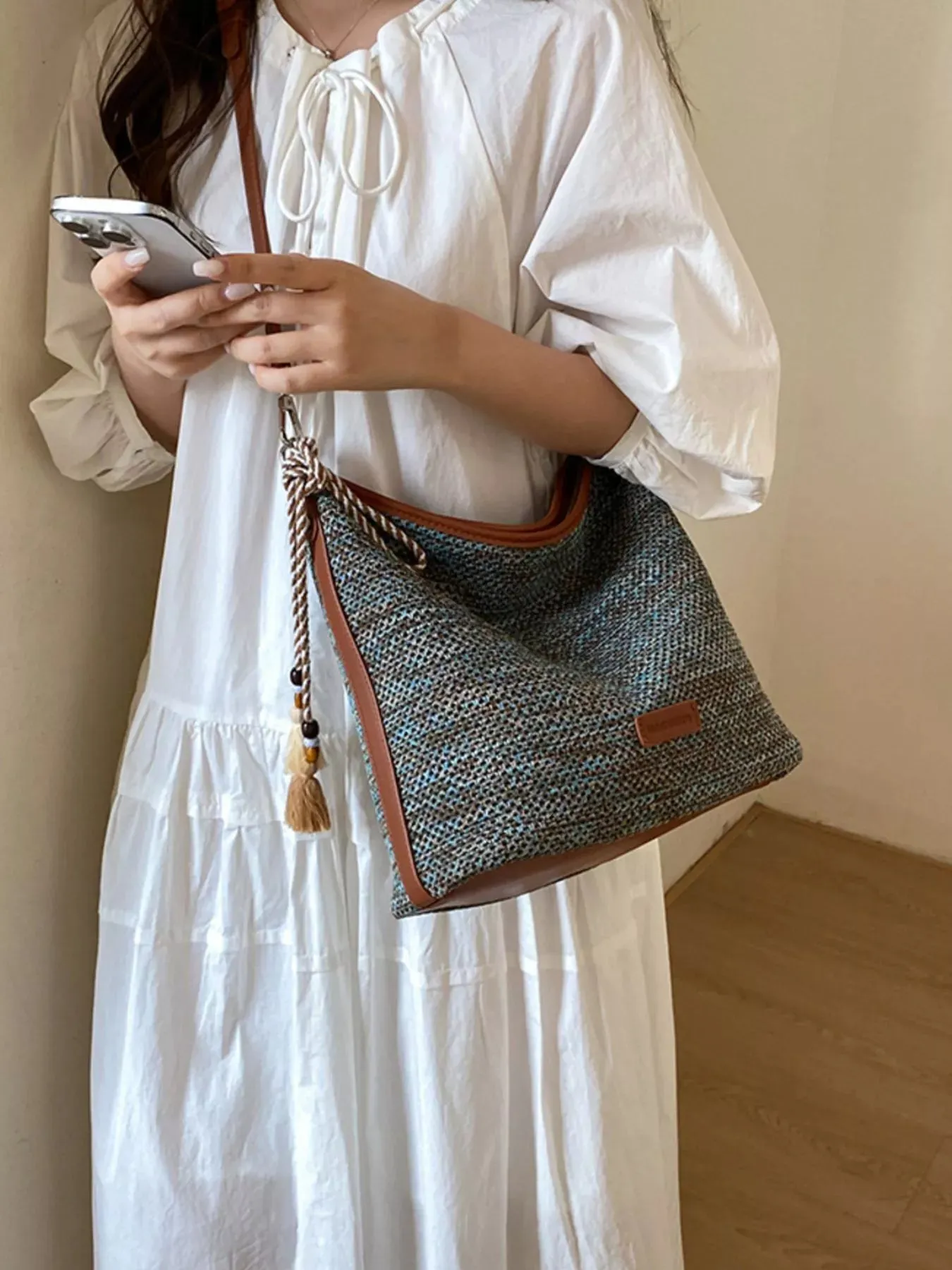 Tassel Woven Crossbody Bag sold by Charming Charlie product image thumbnail 2