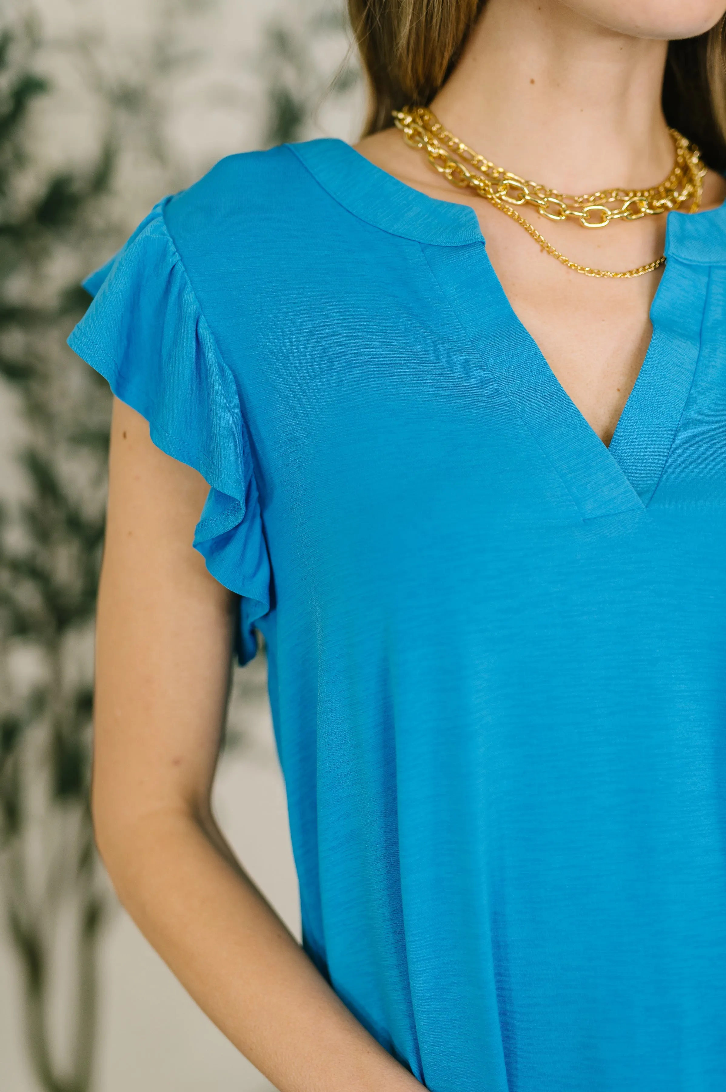 Lizzy Flutter Sleeve V-Neck Blouse in in Aqua sold by Charming Charlie product image thumbnail 2