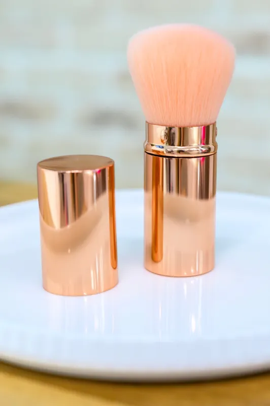 Rose Gold and Pink Telescopic Powder Brush made by Charming Charlie