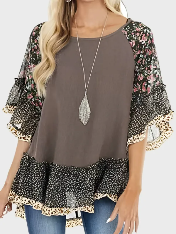 Full Size Frill Printed Round Neck Half Sleeve Blouse sold by Charming Charlie