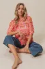 BiBi Openwork Fringed Knit Cover Up sold by Charming Charlie