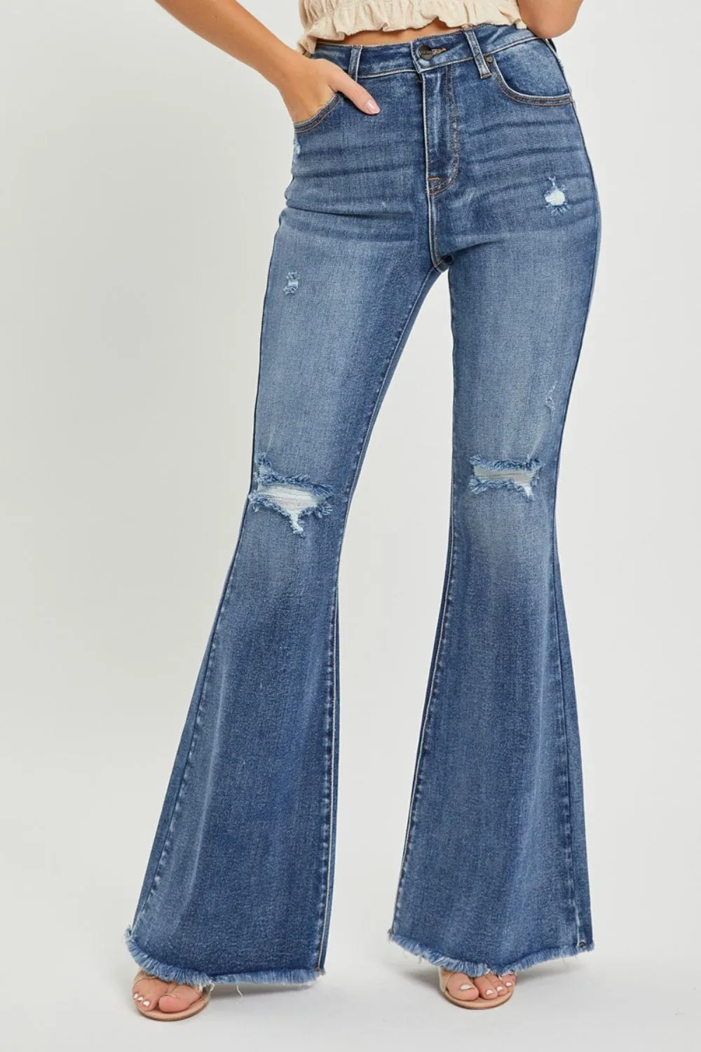 RISEN High Waist Distressed Fare Jeans sold by Charming Charlie