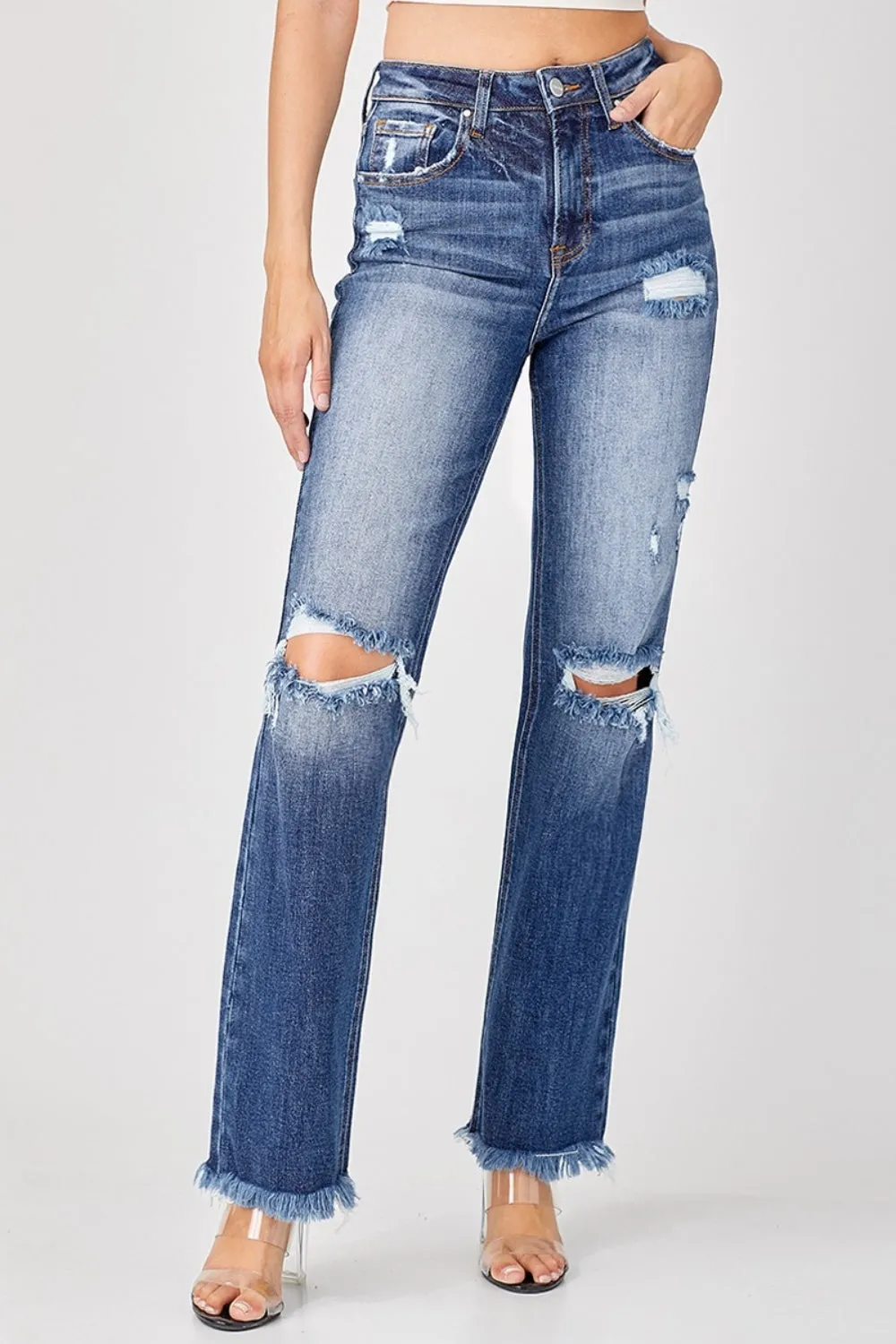 Risen Full Size Raw Hem Distressed Straight Jeans sold by Charming Charlie