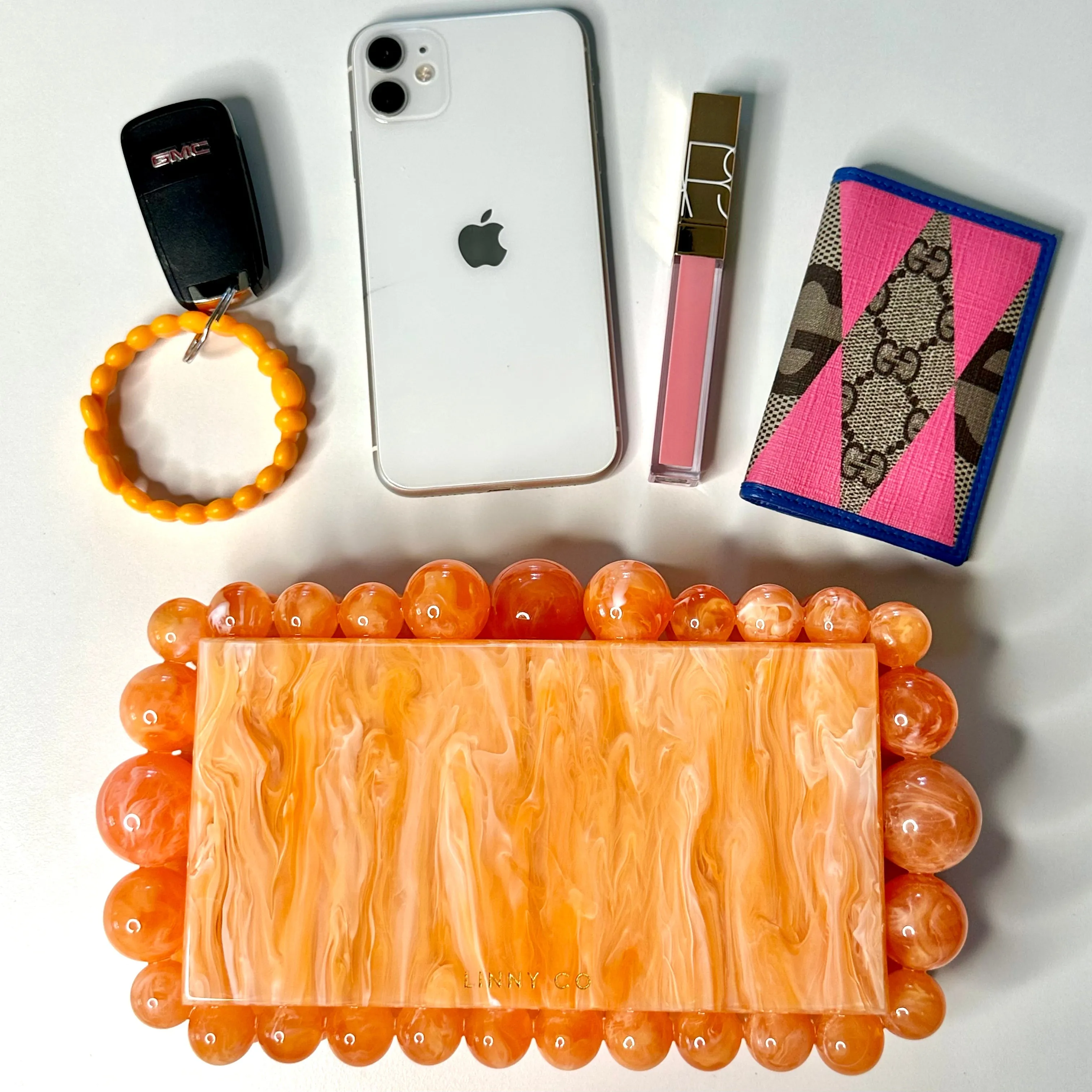 Daphne Clutch - Orange sold by Charming Charlie product image thumbnail 2