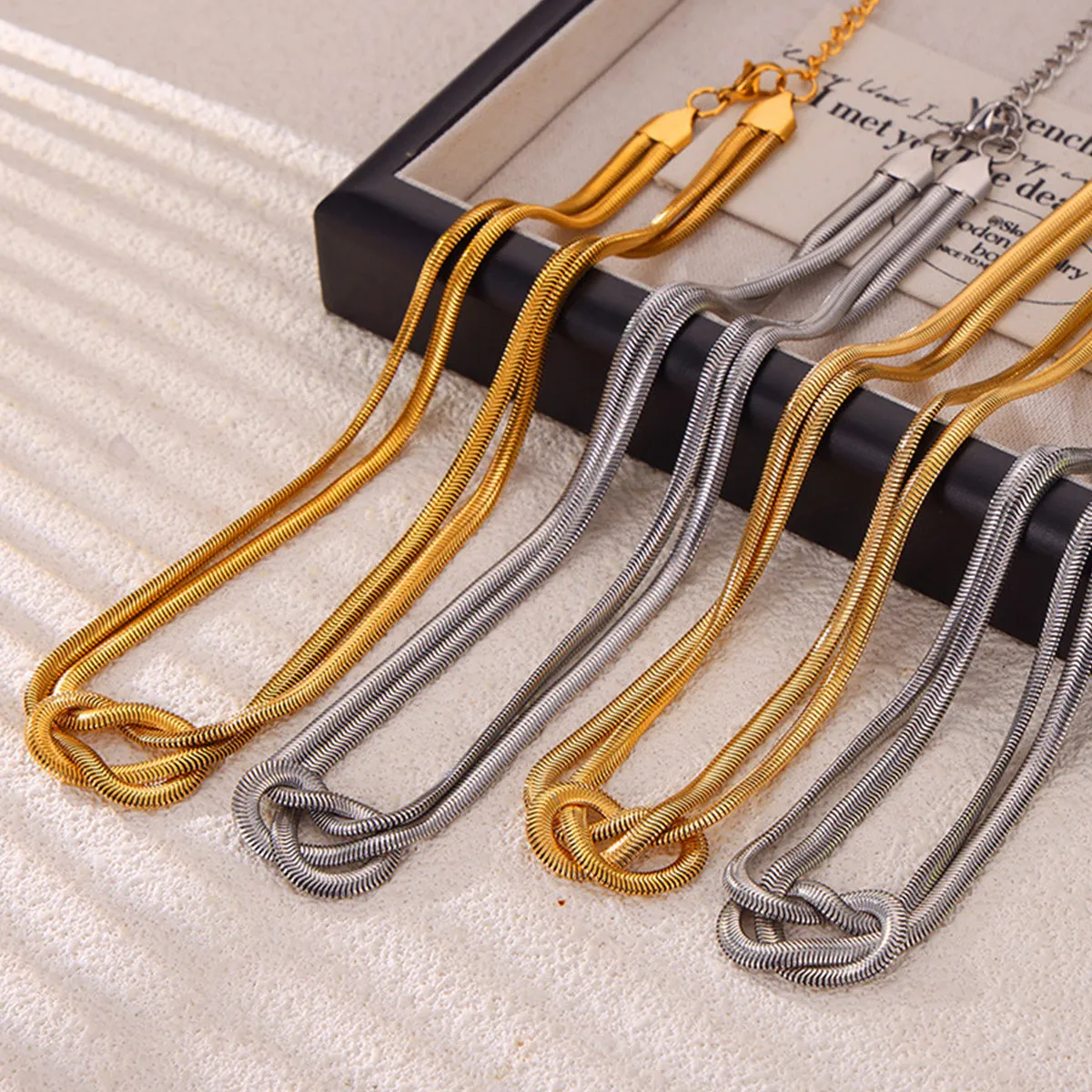 Titanium Steel Knot Necklace sold by Charming Charlie product image thumbnail 4