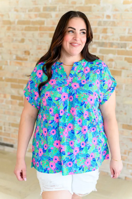 Lizzy Cap Sleeve Top in Mint and Lavender Floral sold by Charming Charlie