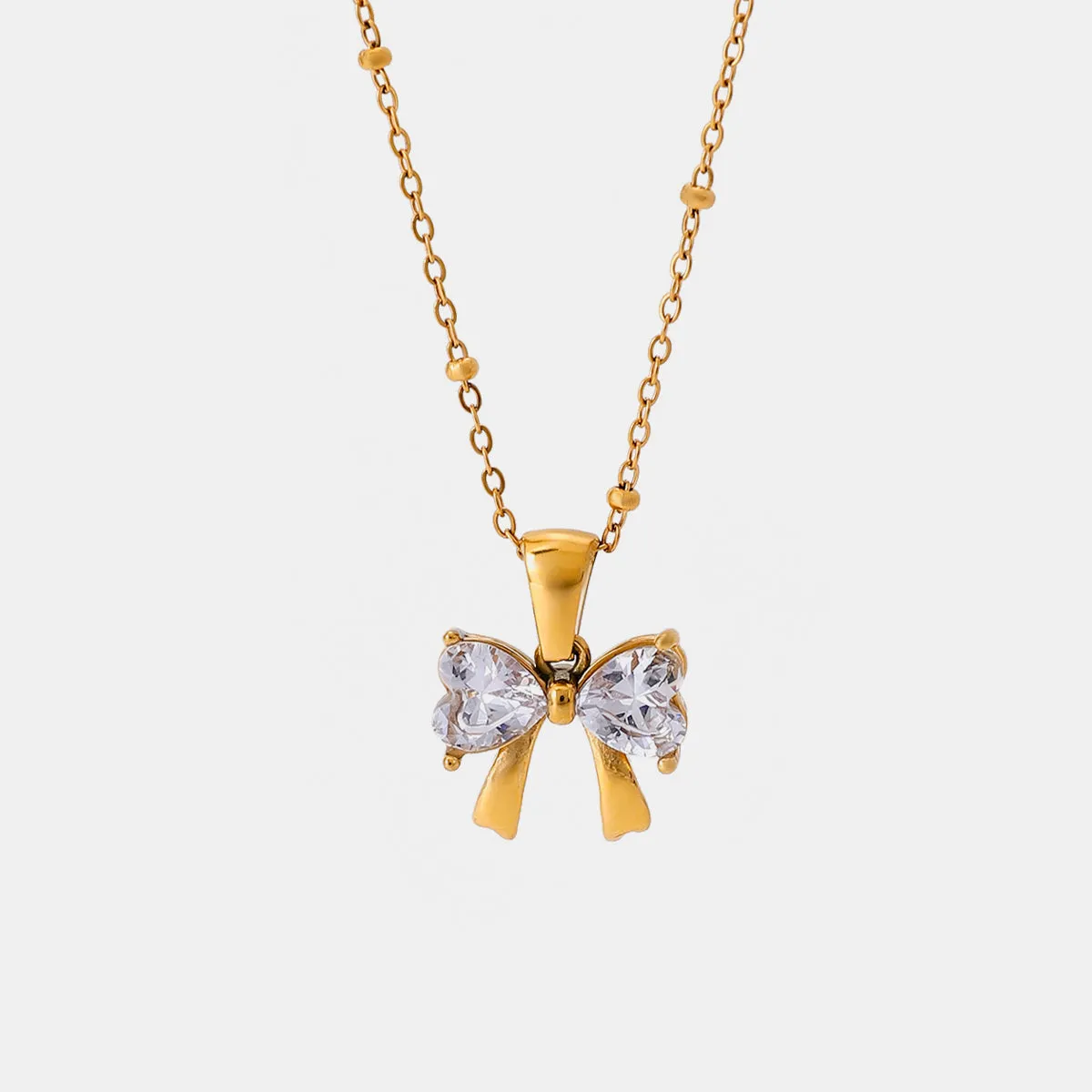Stainless Steel Inlaid Zircon Bow Necklace sold by Charming Charlie