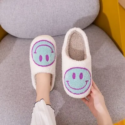 Melody Smiley Face Slippers sold by Charming Charlie