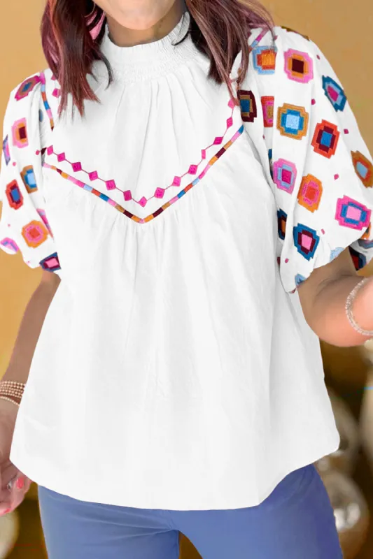 Printed Mock Neck Puff Sleeve Blouse sold by Charming Charlie