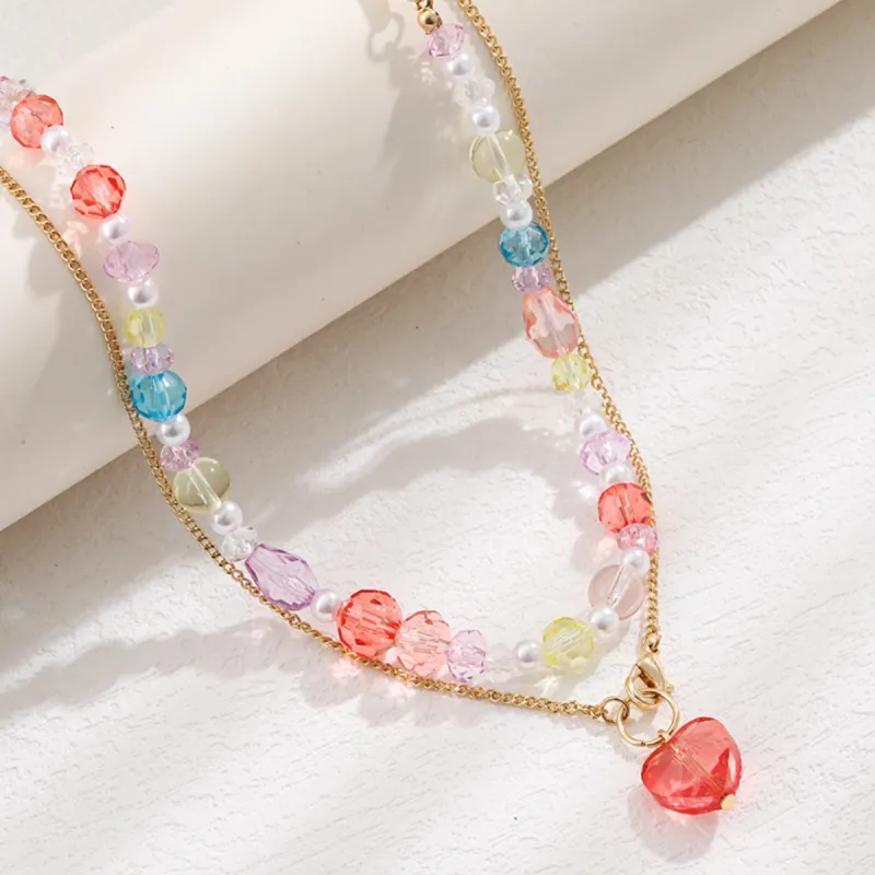 Beaded Double-Layered Heart Pendant Necklace sold by Charming Charlie