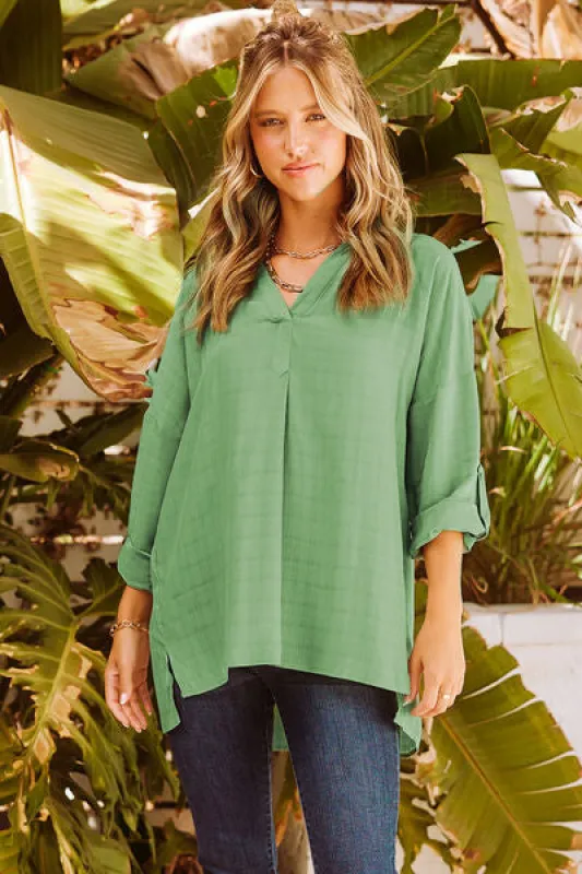 Notched Roll-Tab Sleeve Blouse sold by Charming Charlie