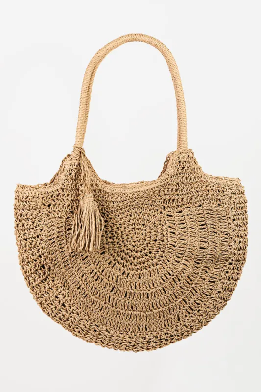 Fame Straw Braided Tote Bag with Tassel sold by Charming Charlie