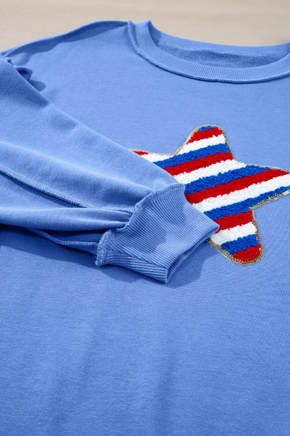 Exposed Seam Star Long Sleeve Sweatshirt sold by Charming Charlie product image thumbnail 4