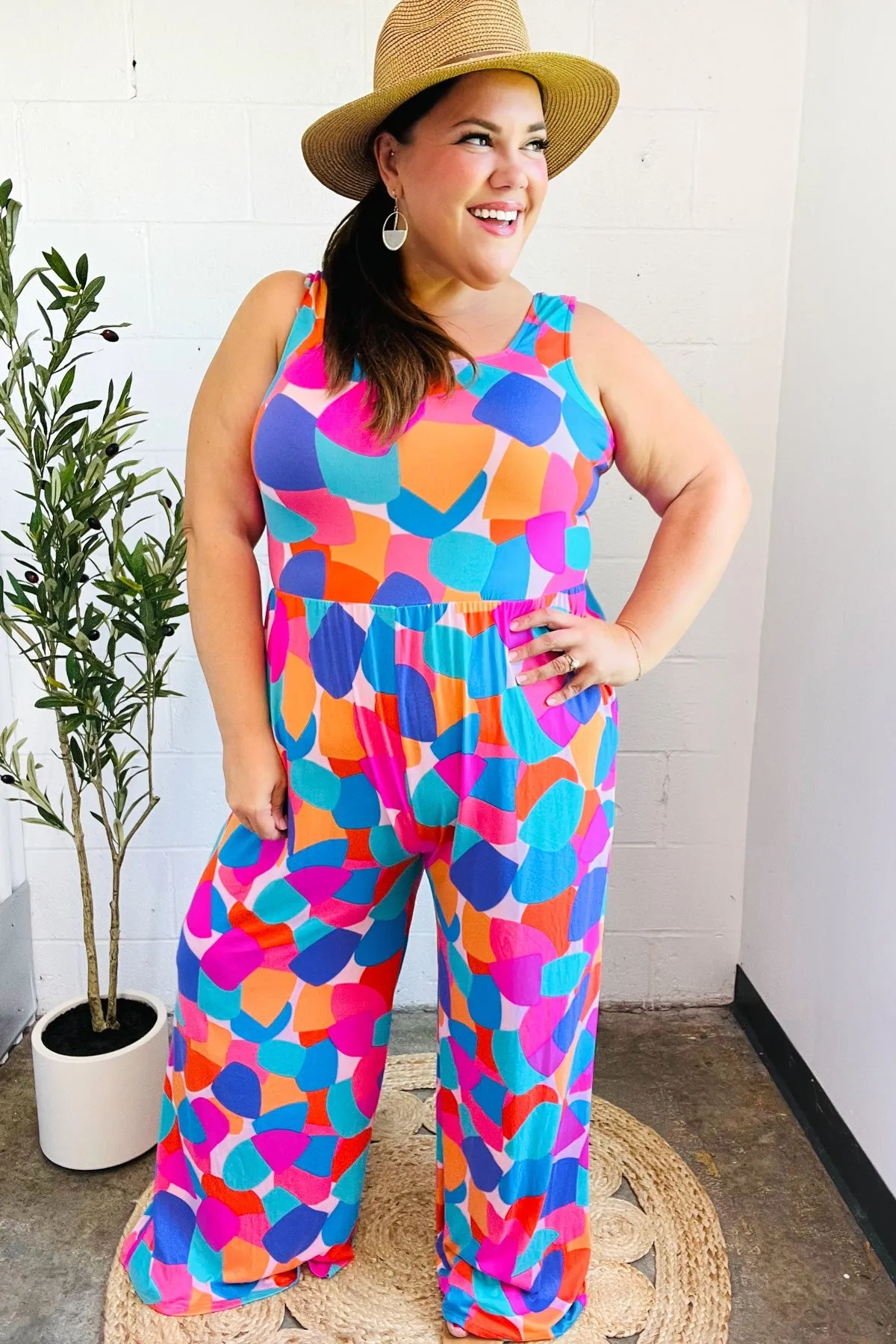 Summer Vibes Multicolor Abstract Floral Sleeveless Wide Leg Jumpsuit sold by Charming Charlie