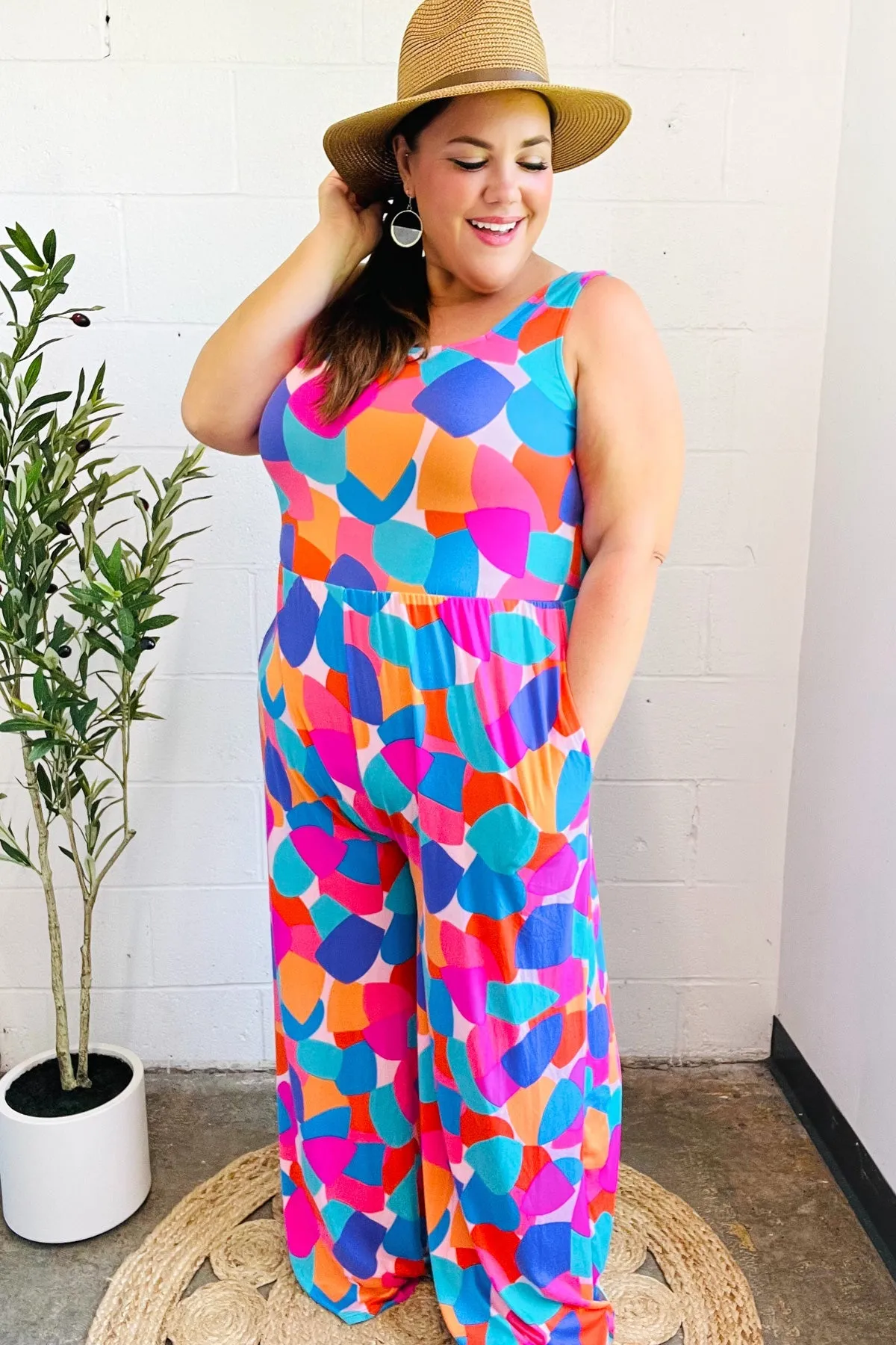 Summer Vibes Multicolor Abstract Floral Sleeveless Wide Leg Jumpsuit sold by Charming Charlie product image thumbnail 5