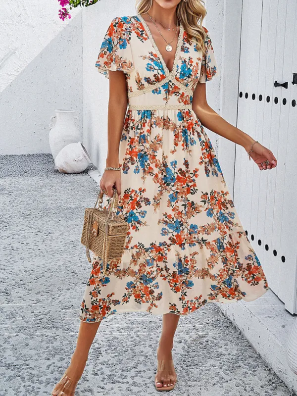 Printed V-Neck Flutter Sleeve Midi Dress sold by Charming Charlie