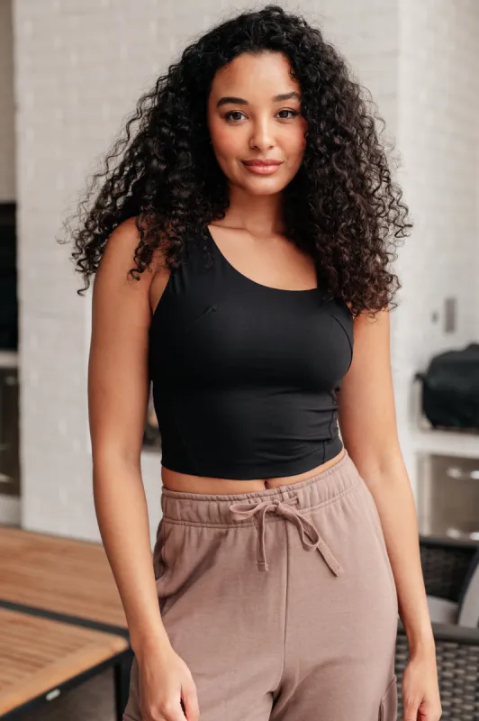 Doing it For Me Asymmetrical Tank in Black sold by Charming Charlie