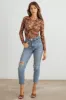 HERA COLLECTION Abstract Mesh Lace-Up Long Sleeve Bodysuit sold by Charming Charlie