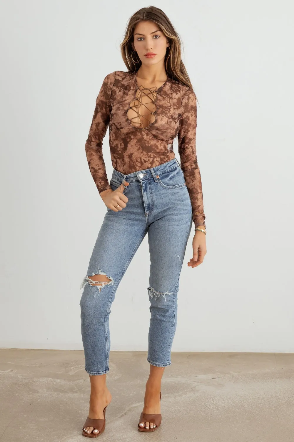 HERA COLLECTION Abstract Mesh Lace-Up Long Sleeve Bodysuit sold by Charming Charlie product image thumbnail 5