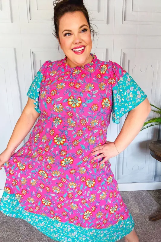 Charming Fuchsia & Mint Floral Frill Mock Neck Flutter Sleeve Midi Dress sold by Charming Charlie