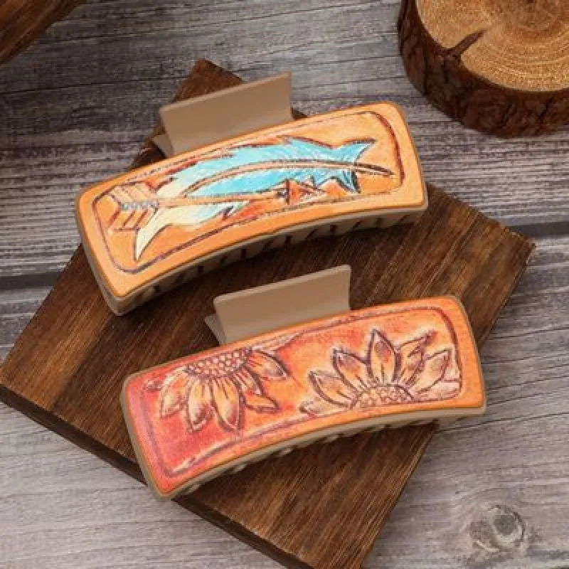 PU Leather Acrylic Claw Clip sold by Charming Charlie