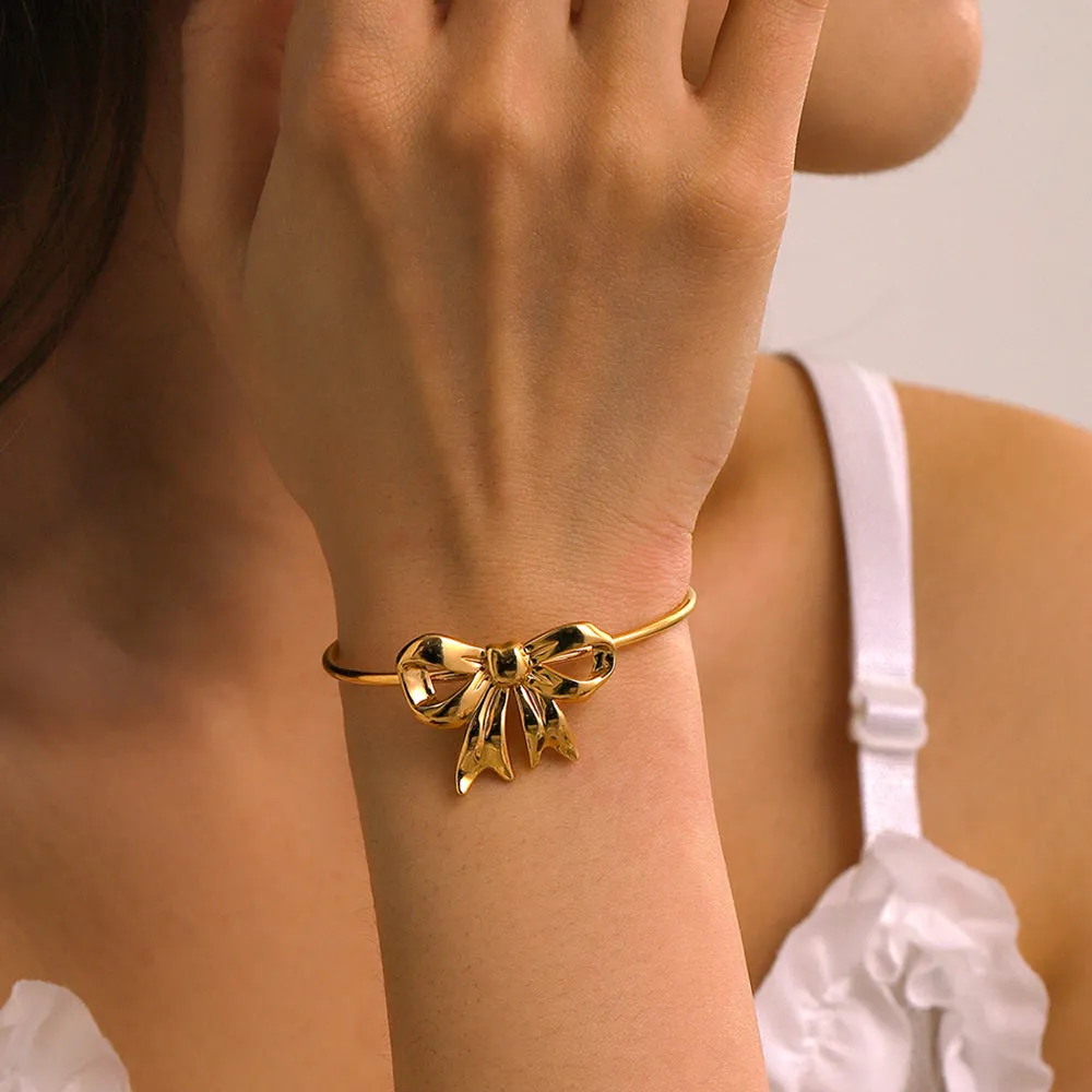 18K Gold-Plated Stainless Steel Bow Bracelet sold by Charming Charlie