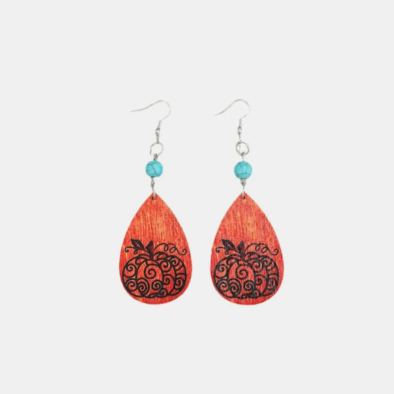Turquoise Wooden Pumpkin Teardrop Earrings sold by Charming Charlie