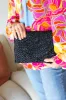 Black Raffia Woven Wrist Strap Clutch Bag sold by Charming Charlie