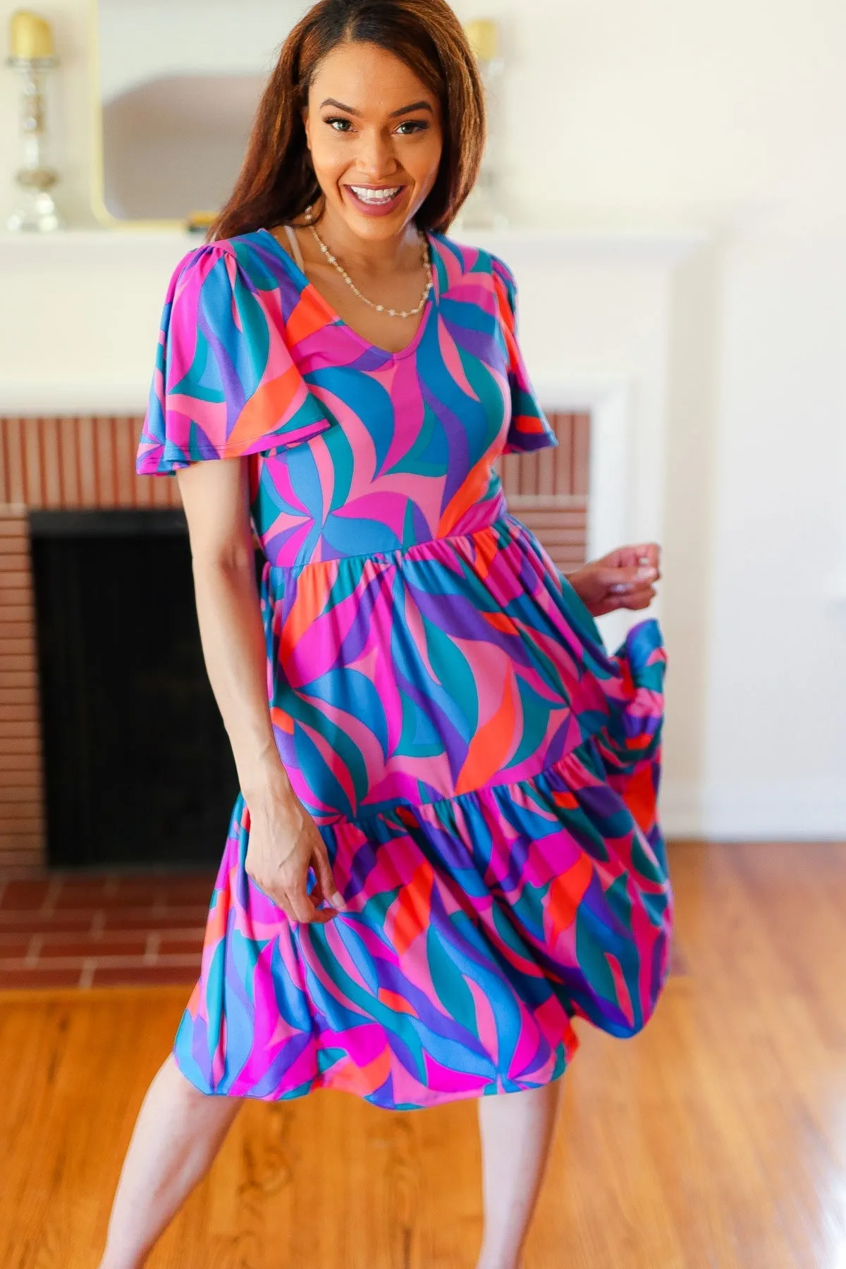 Remember Me Blue & Fuchsia Geo Print V Neck Dress sold by Charming Charlie