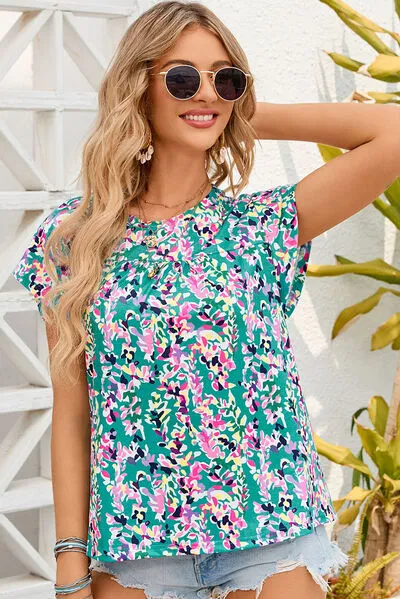 Printed Round Neck Cap Sleeve Blouse sold by Charming Charlie