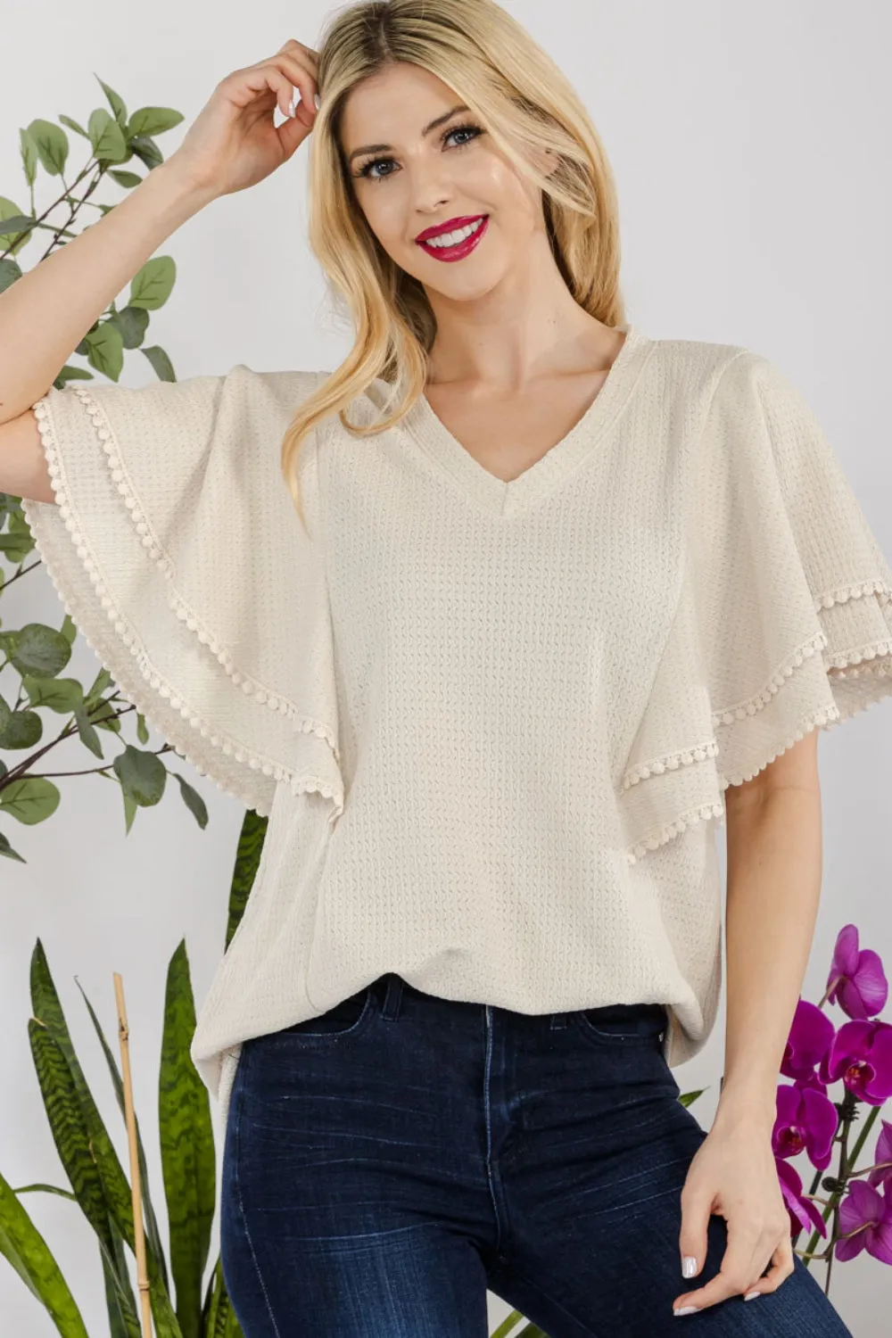 Celeste Full Size V-Neck Lace Trim Flutter Sleeve Top sold by Charming Charlie