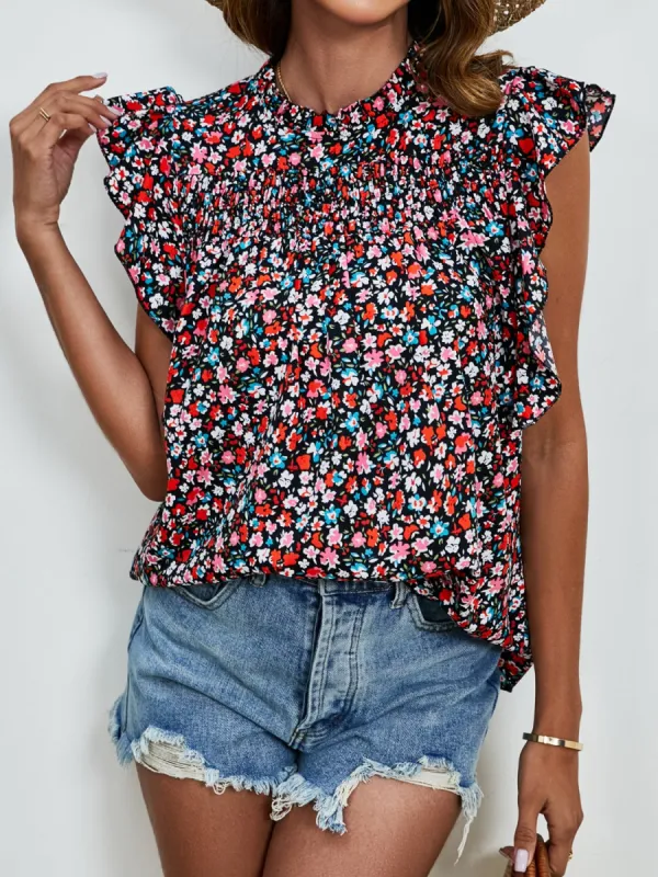 Ruffled Ditsy Floral Mock Neck Cap Sleeve Blouse sold by Charming Charlie