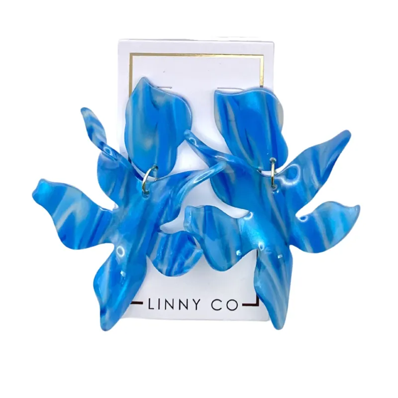 Flora - Blue Iris sold by Charming Charlie