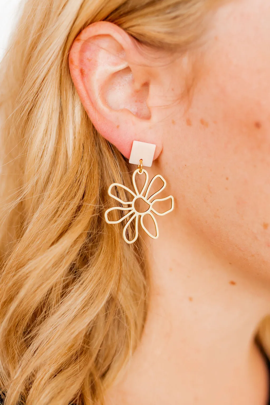 Daisy - Cream sold by Charming Charlie