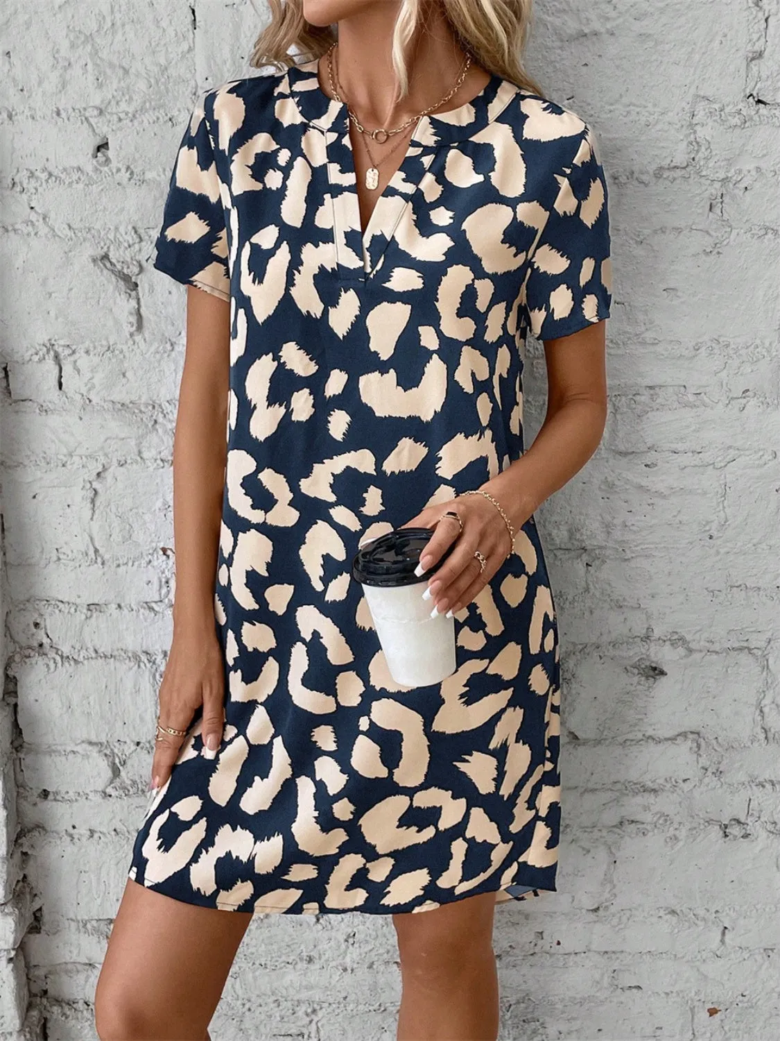 Printed Notched Short Sleeve Mini Dress sold by Charming Charlie product image thumbnail 5
