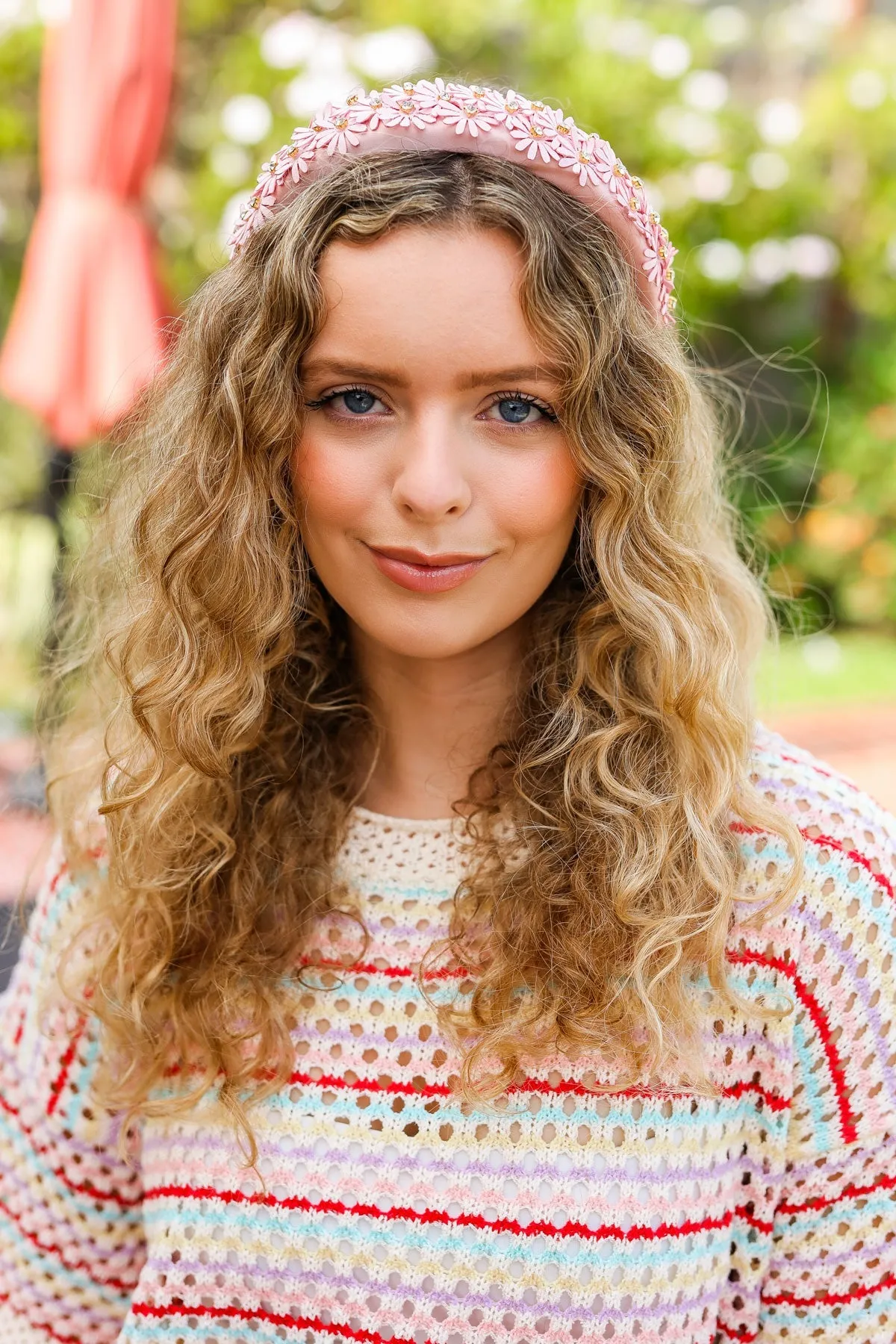 Pink Satin Daisy Rhinestone Headband sold by Charming Charlie product image thumbnail 2