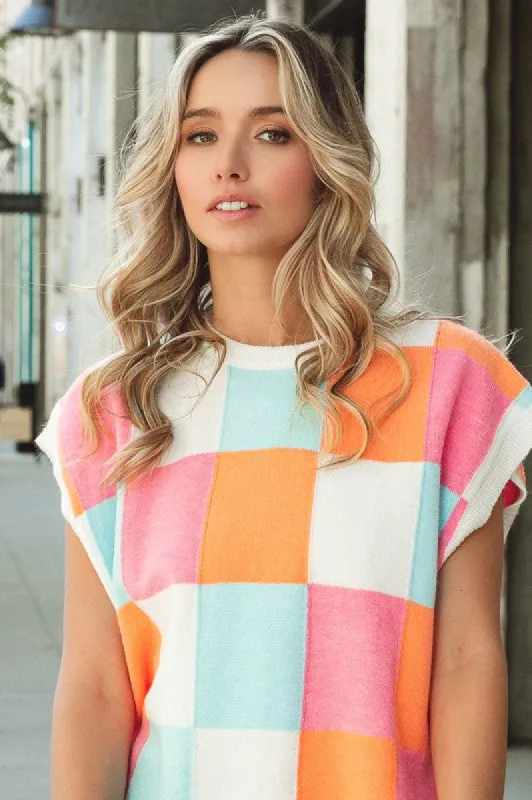 Multi-Color Checker Sweater Vest sold by Charming Charlie