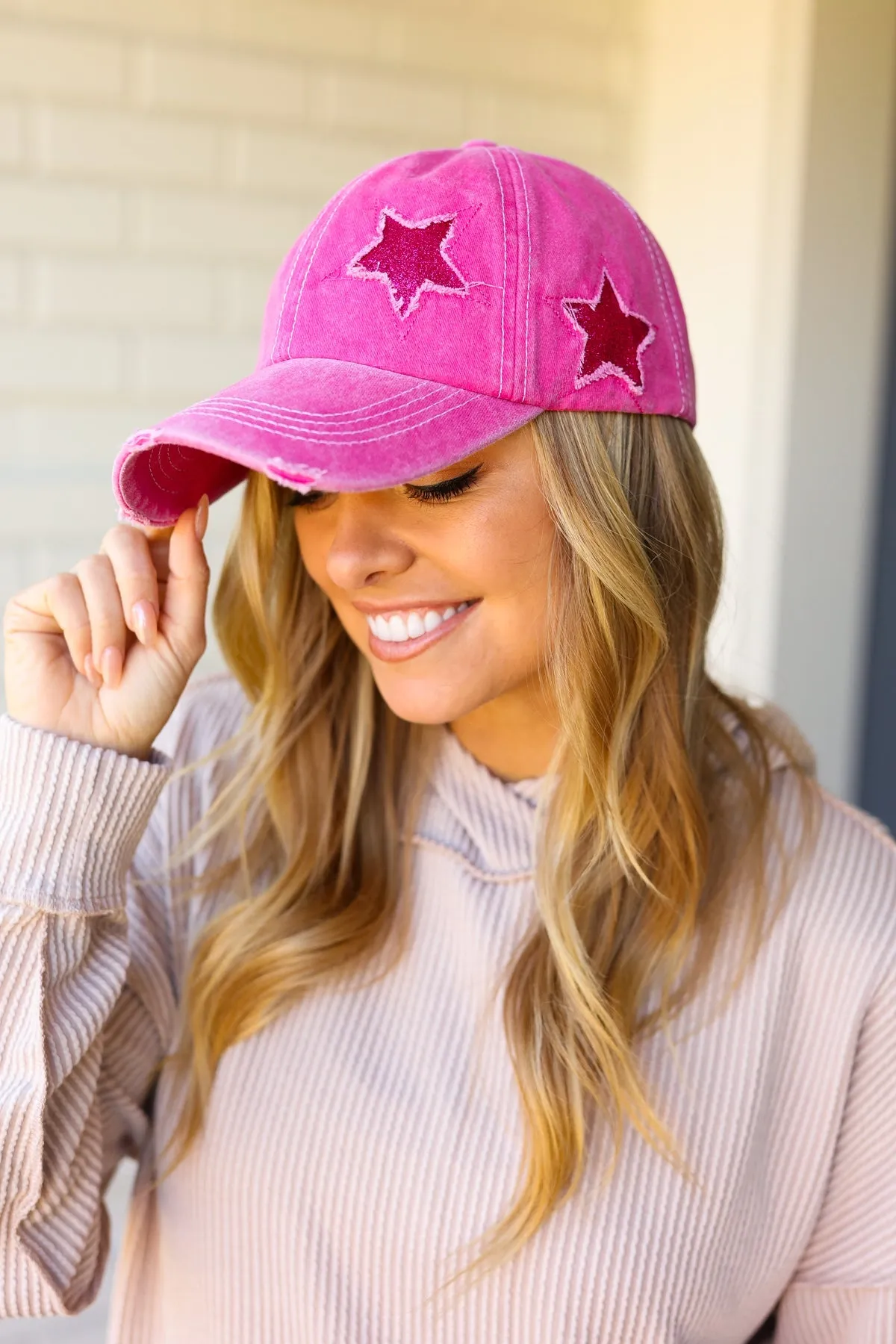 Fuchsia Glitter Star Distressed Baseball Cap sold by Charming Charlie