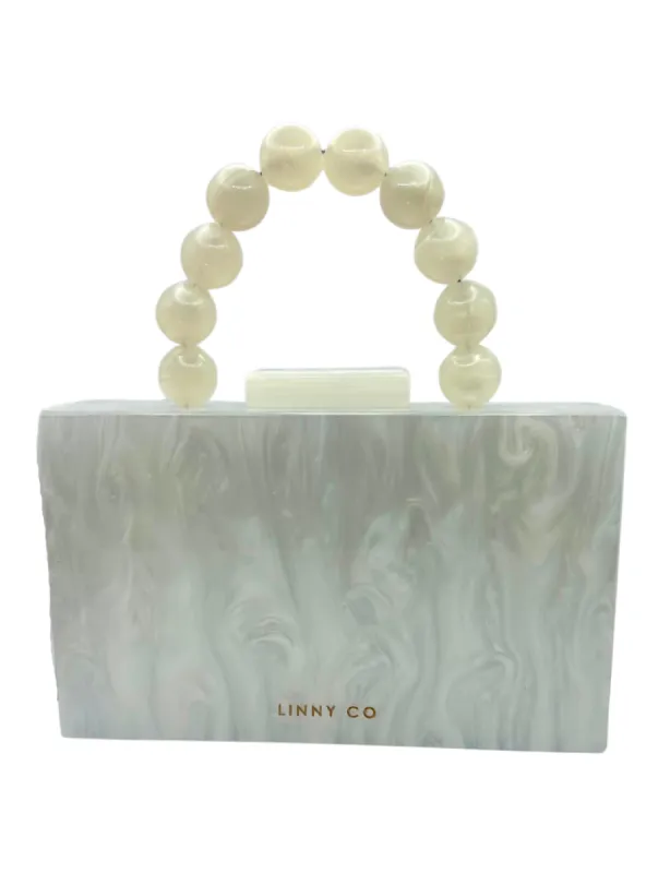 Cecelia Clutch - Pearl White sold by Charming Charlie